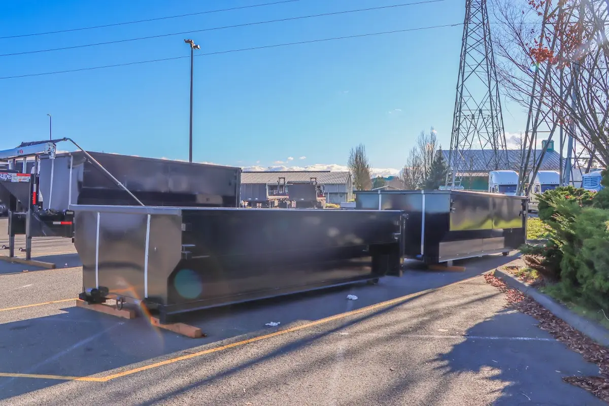 Roll-off dumpster ready for waste disposal at job site for 12 Yard Dumpster Rental in Eastman